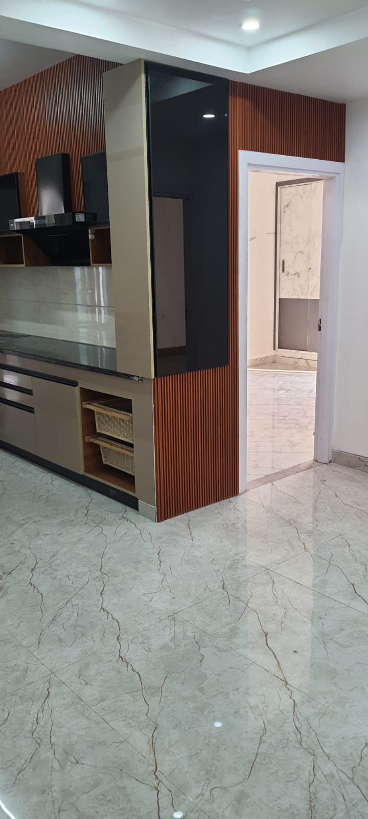 Beige Kitchen with Wood-Slat Pillar